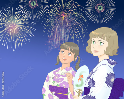 Women in floral-design yukata watching fireworks