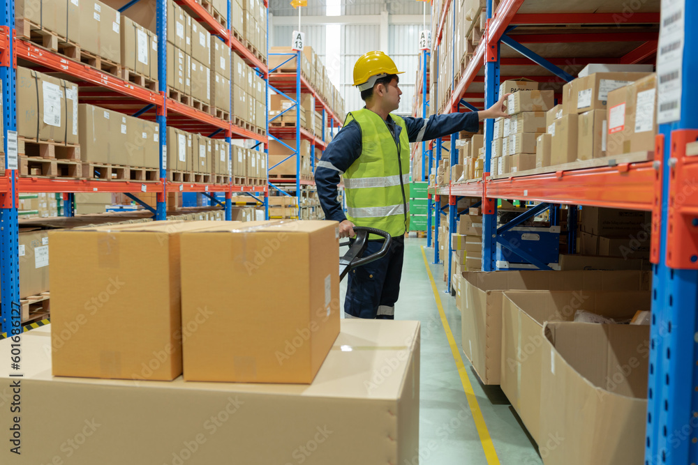 Warehouse worker pick box goods in inventory and check stock product. Transport logistic business ship delivery to customer. stock card, bill of material, inspection, storehouse, storage, factory - obrazy, fototapety, plakaty 