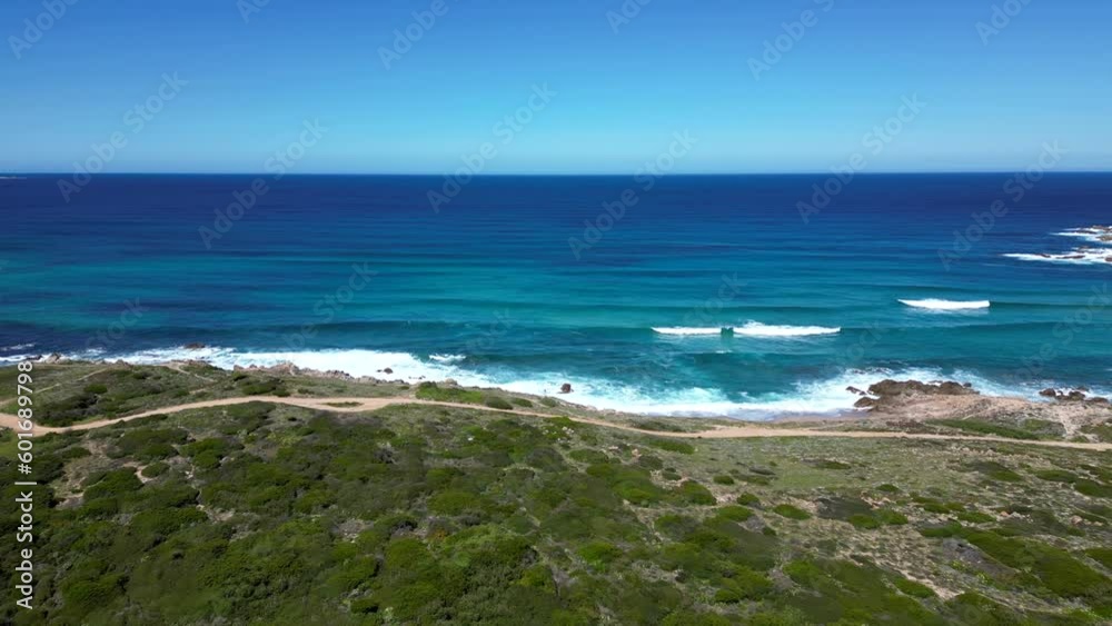 4K Aerial view of Monti Russo beach, famous surf destination in Sardinia, Italy 4K Aerial view of Monti Russo beach, famous surf destination in Sardinia, Italy