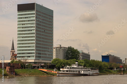 Mannheim; Südliches Neckarufer mit MVV Hochhaus und Museumsschiff photo