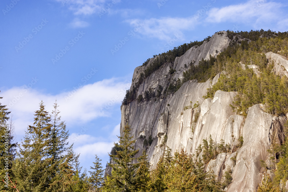 Rocky cliffs on Chief Mountain in Squamish, BC, Canada. Nature Background. Sunny day.