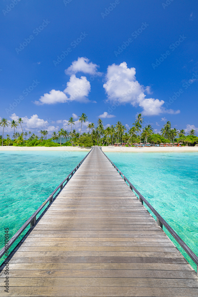 Amazing travel landscape concept. Beautiful best tropical Maldives island and wooden pier pathway. Sunny beach sea bay coconut palm trees on blue sky for nature holiday vacation background concept