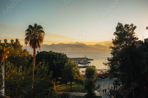 Sunset view of the  harbor with ships near the old town of Kaleici in Antalya.