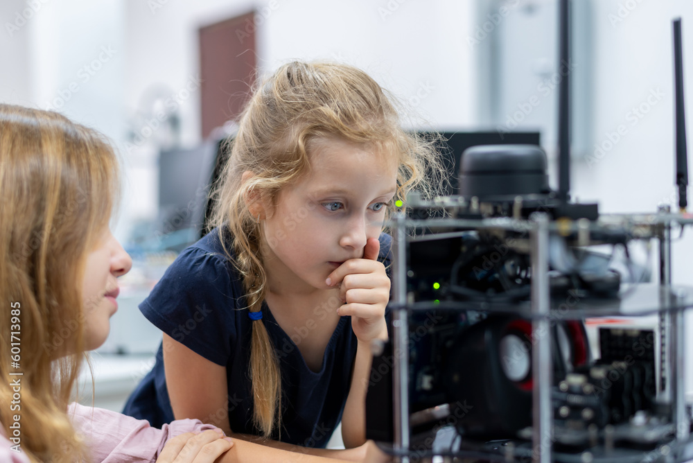 Group Kid teen child enjoy Machine Learning Robot arm is Moving Under coding Control robot at stem technology class, stem education for digital automation learn for use artificial intelligence ai Group Kid teen child enjoy Machine Learning Robot arm is Moving Under coding Control robot at stem technology class, stem education for digital automation learn for use artificial intelligence ai