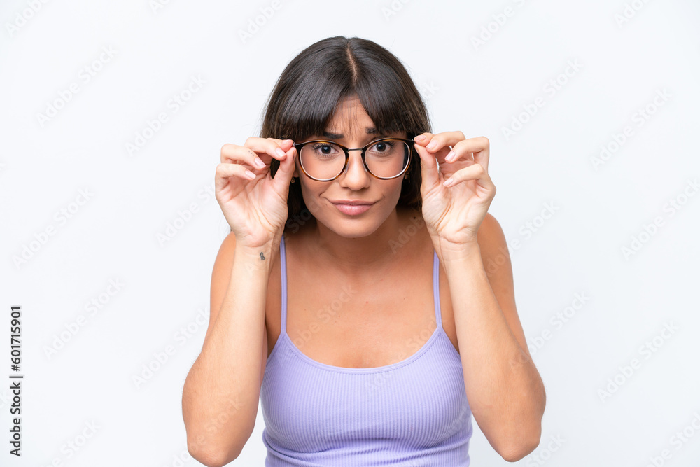 Young caucasian woman over isolated background With glasses and frustrated expression