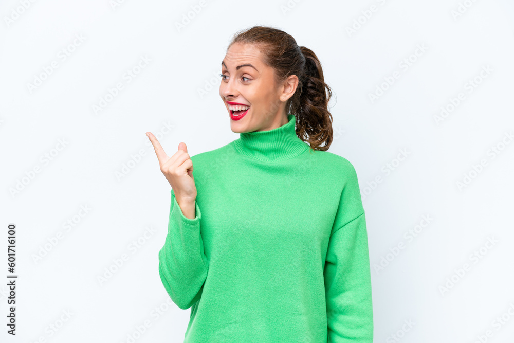 Young caucasian woman isolated on white background intending to realizes the solution while lifting a finger up Young caucasian woman isolated on white background intending to realizes the solution while lifting a finger up