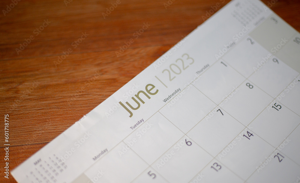 Selective focus shot of a closeup calendar of June 2023. June 2023 calendar isolated on background. Selective focus shot of a closeup calendar of June 2023. June 2023 calendar isolated on background.