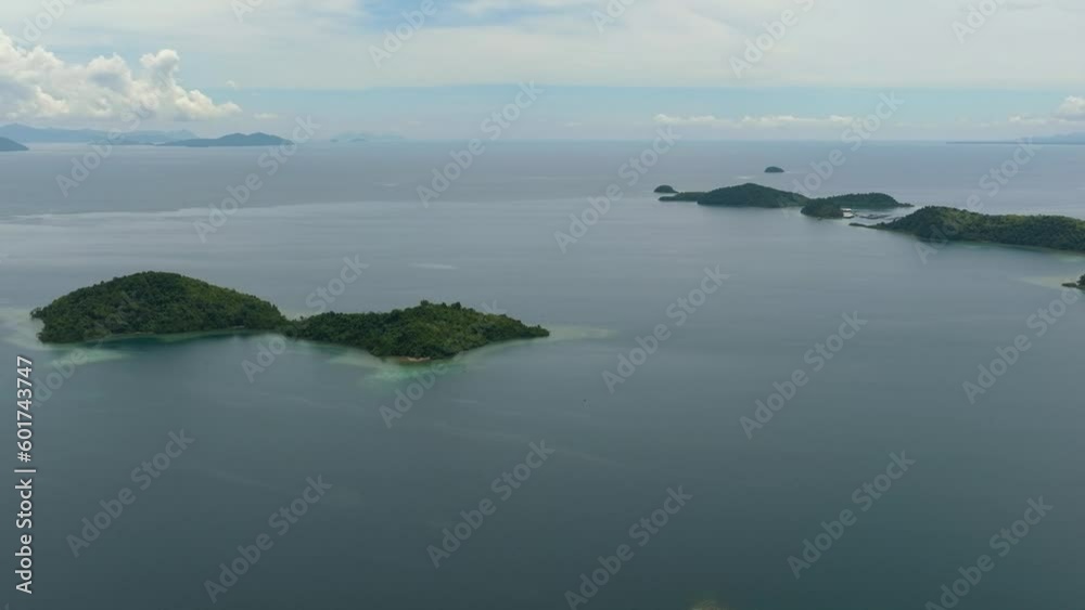 Tropical islands in the sea view from above. Borneo, Sabah. Malaysia. Tropical islands in the sea view from above. Borneo, Sabah. Malaysia.