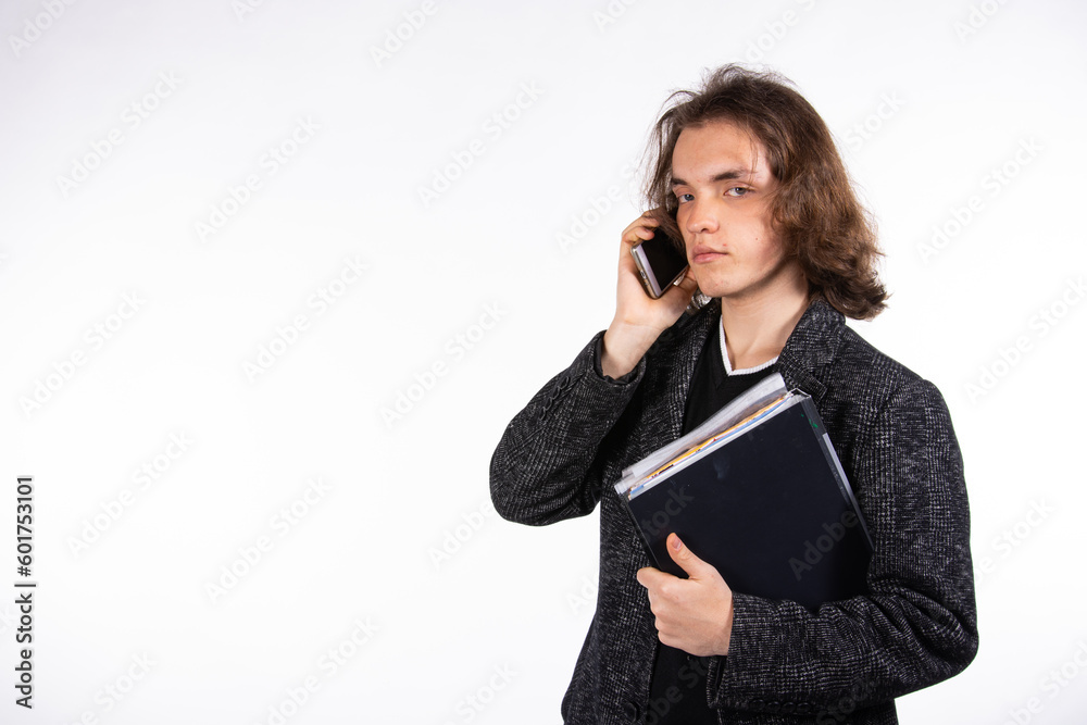 Young attractive student posing in the studio. Young attractive student posing in the studio.