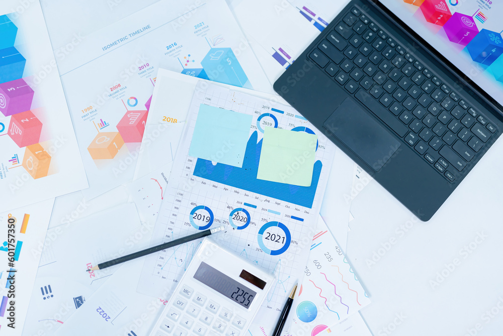 business desk with keyboard report chart pen and tablet on white table business desk with keyboard report chart pen and tablet on white table