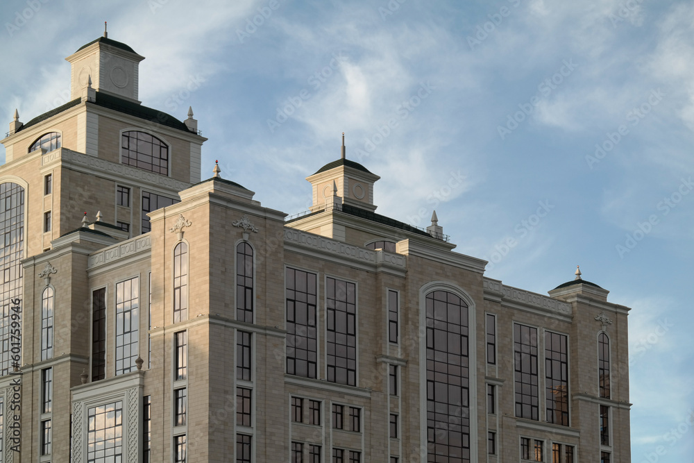 Fototapeta premium Facade and roof of a residential complex in the city of Almaty, Kazakhstan.