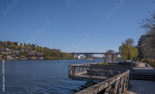Boardwalk path way at a lake passage between islands in the sea Mälaren, a sunny early summer day in Stockholm © Hans Baath