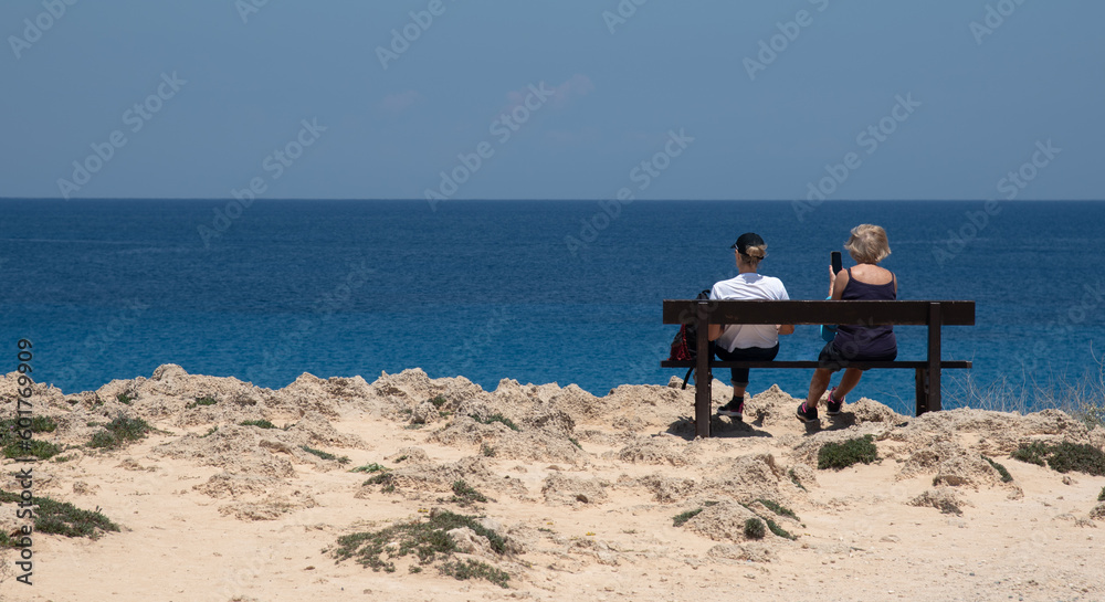 Unrecognized women enjoying the sea at vacations. Summertime  holidays