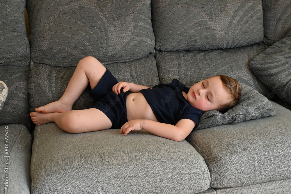 Fototapeta premium person sleeping on sofa