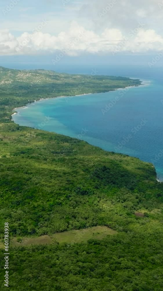 Aerial shot of this Magnificent Island surrounded by calm and deep blue sea water. Siquijor, Philippines. Aerial shot of this Magnificent Island surrounded by calm and deep blue sea water. Siquijor, Philippines.