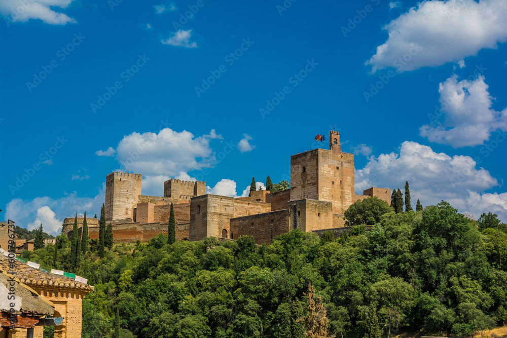 View of the Alhambra of Granada, Spain on a sunny day. One of the most important sightseeing spots to visit in Granada.