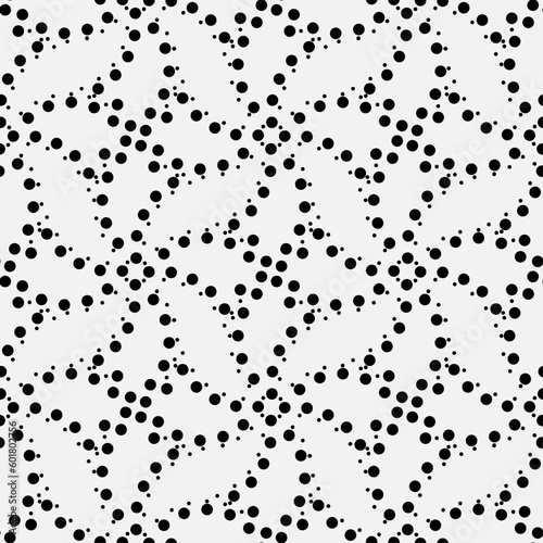 Vector seamless models. The composition of regularly repeating points, circles. Monochrome, simple.