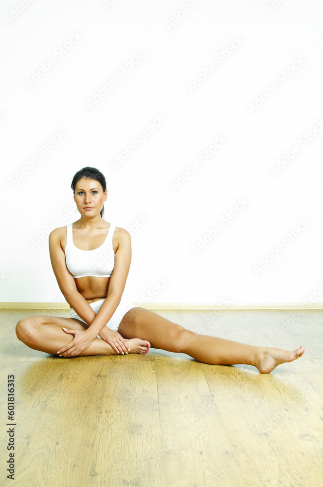 Young beautiful woman during fitness time and exercising Young beautiful woman during fitness time and exercising
