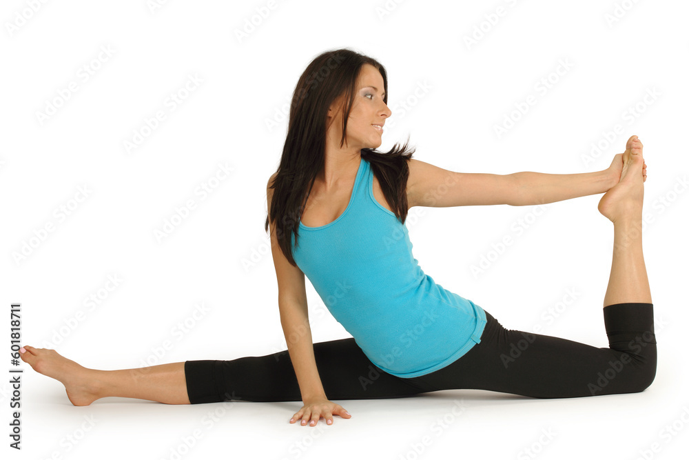 Young attractive women in her early 20's showing her flexibility doing the splits. Young attractive women in her early 20's showing her flexibility doing the splits.