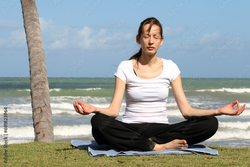 relaxing and breath exercise on the beach