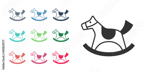 Black Wooden horse in saddle swing for little children icon isolated on white background. Set icons colorful. Vector