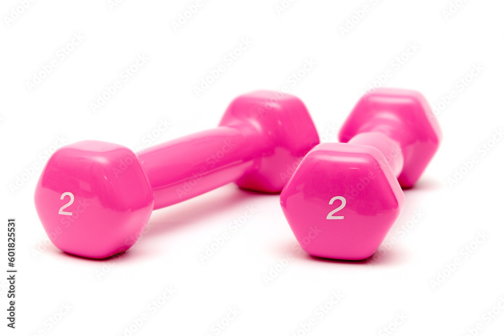 two pink dumbbells on the white background two pink dumbbells on the white background