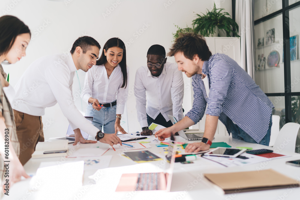 Group multiethnic of colleagues working on creative project Group multiethnic of colleagues working on creative project