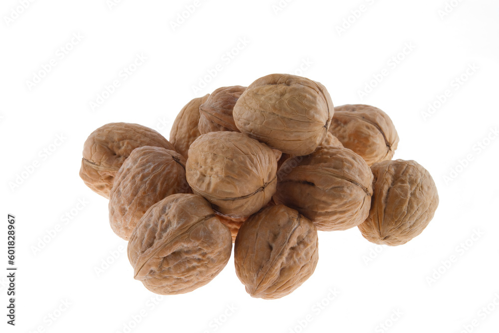 A handful of walnuts isolated on white background A handful of walnuts isolated on white background