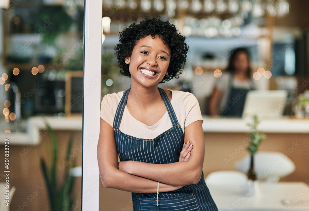 Happy woman, portrait and arms crossed at cafe in small business or waitress at entrance. Confident African female person, barista or restaurant smiling in confidence for management at coffee shop