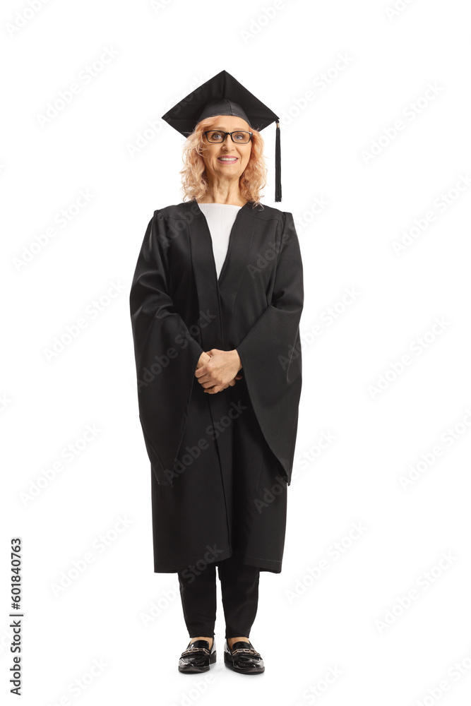Full length portrait of a female teacher in a graduation gown Full length portrait of a female teacher in a graduation gown