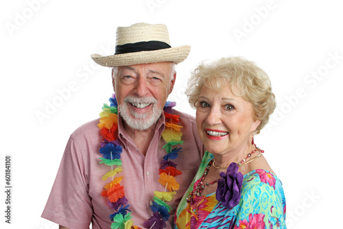 An attractive mature couple enjoying their second honeymoon on a tropical vacation. photo