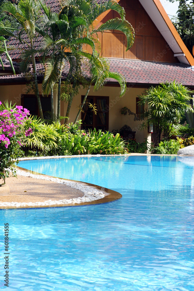 Tropical spa resort with a swimming pool in Phuket, Thailand - travel and tourism.