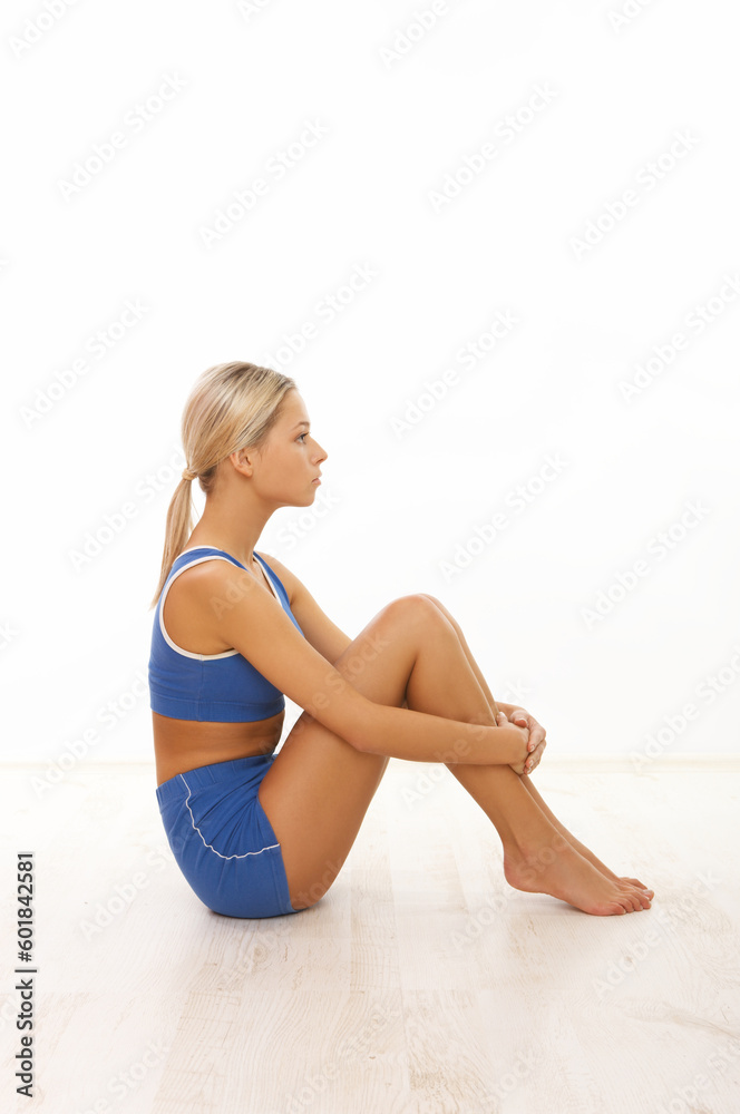 Young beautiful woman during fitness time and exercising Young beautiful woman during fitness time and exercising