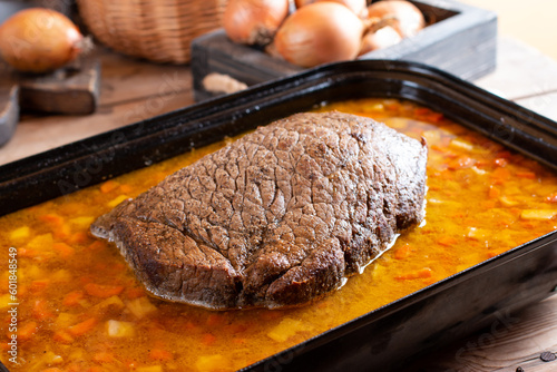 Baked sirloin in vegetable creamy sauce, typical Czech republic food, called 