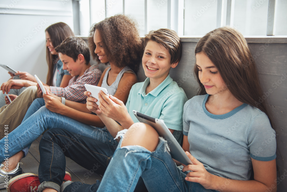 Teenagers with gadgets