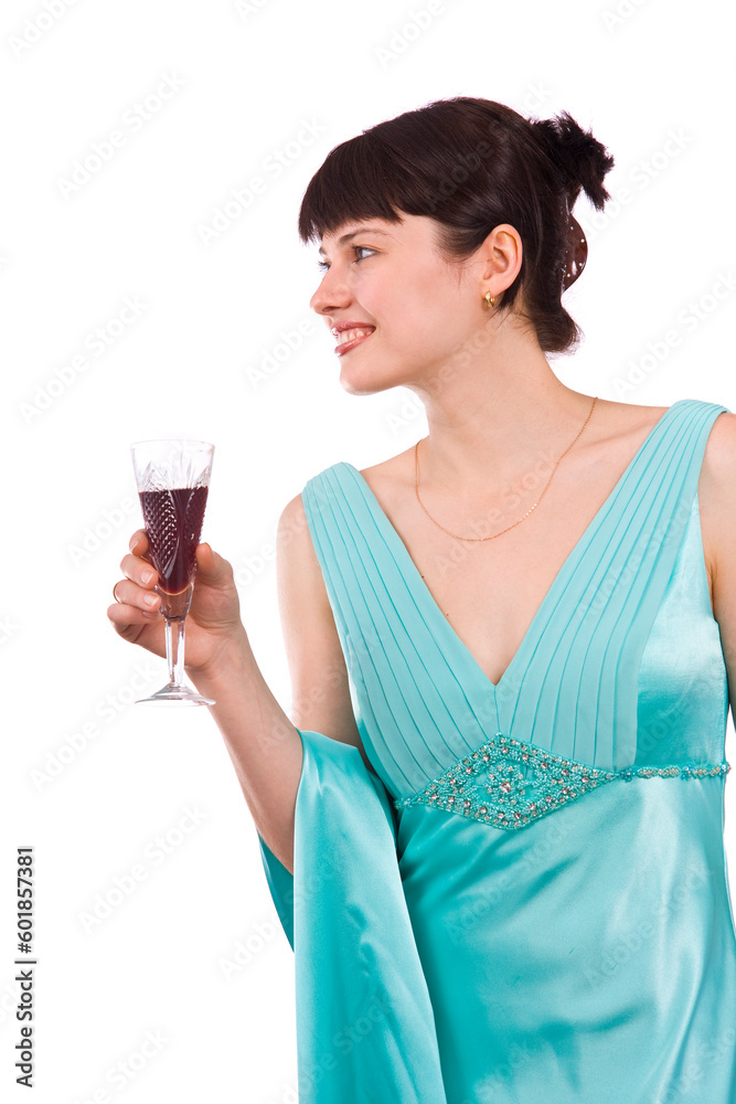 Woman proposes a toast to smb's health. Girl in greenness of the sea dress is standing and holding wine glass. Isolated on white background.