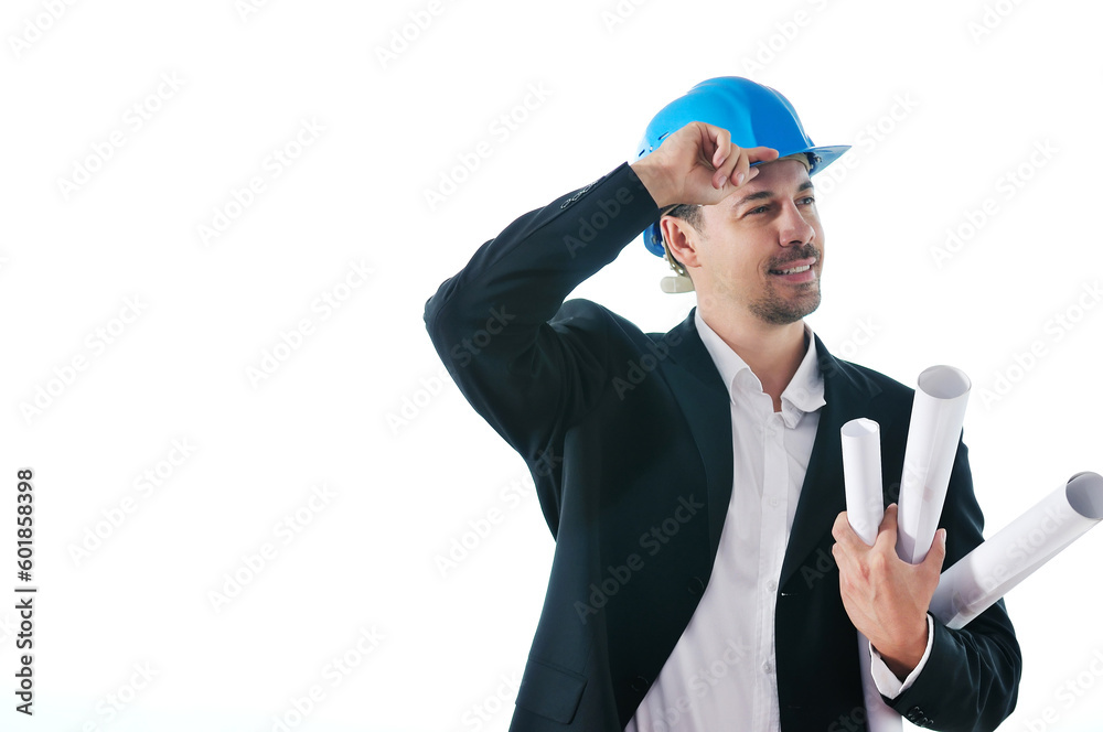 happy young architect portrait with helmet and blueprints indoor at new big bright appartment and construction site happy young architect portrait with helmet and blueprints indoor at new big bright appartment and construction site