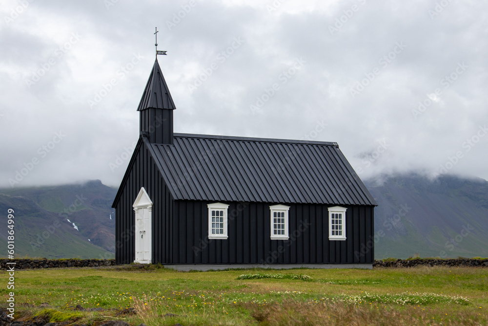 Iceland Black Church in a green meadow