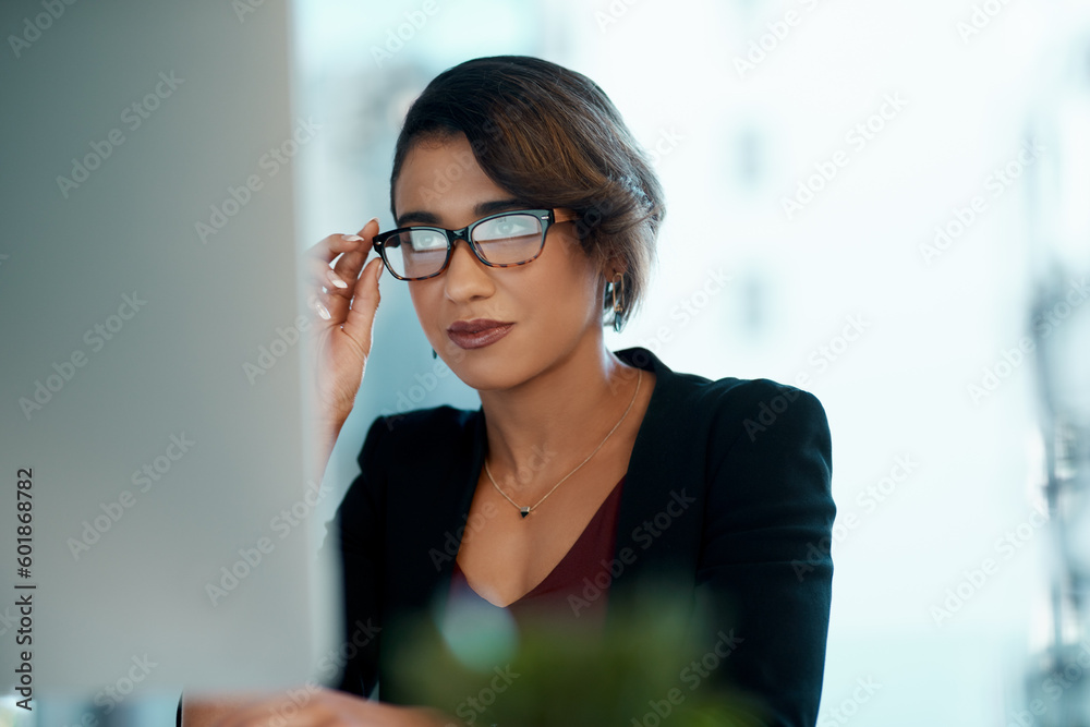Computer, glasses and business woman reading report, online research or article, news and data analysis. Focused african person or professional worker with website editing or analytics on desktop pc Computer, glasses and business woman reading report, online research or article, news and data analysis. Focused african person or professional worker with website editing or analytics on desktop pc