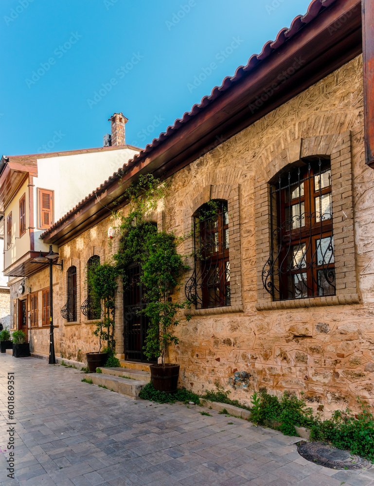 Turkey. Street in the city of Antalya. Old street. An old restored house at sunset.