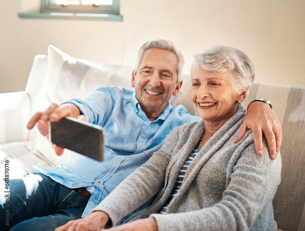 Senior couple, selfie and happy on couch in retirement for social media, blog or post on internet. Elderly man, woman and photography for profile picture on app, web or smile together on lounge sofa Senior couple, selfie and happy on couch in retirement for social media, blog or post on internet. Elderly man, woman and photography for profile picture on app, web or smile together on lounge sofa