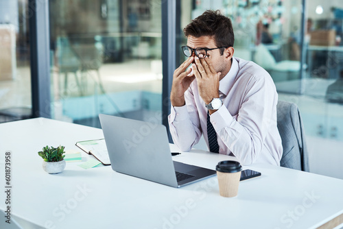 Stress, laptop and man with headache in office frustrated with glitch, mistake or crisis. Anxiety, migraine and male business person angry with fail, 404 or bad review, deadline report or burnout