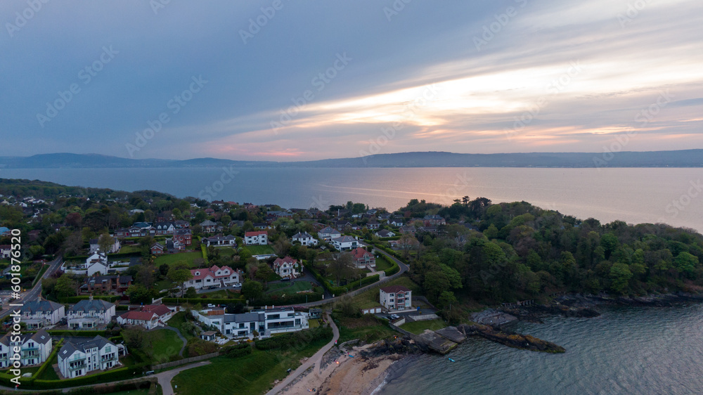 Aerial view on coast of sea at sunset in Helens Bay, Northern Ireland, UK. 