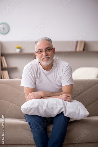 Old man sitting at home © Elnur