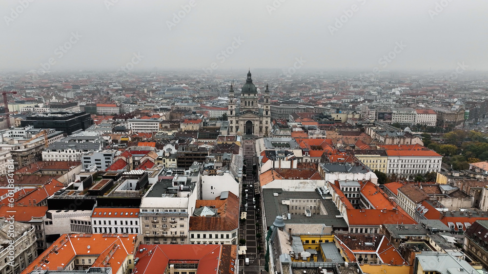 Fototapeta premium Aerial view shot of St. Stephens Basilica, cloudy day, moody Budapest, Hungary