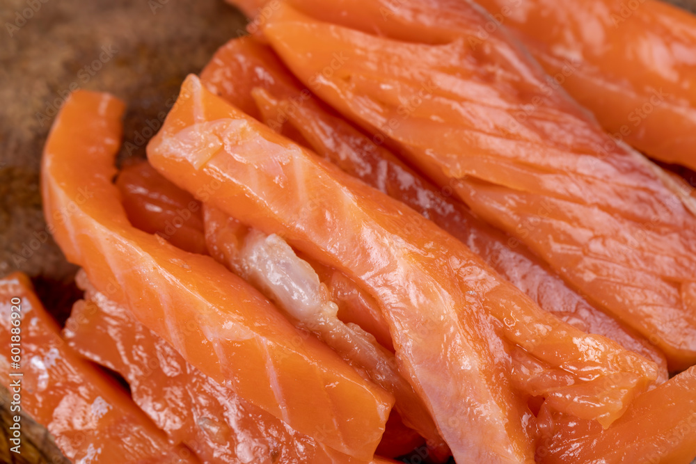 Sliced red trout meat with sea salt Sliced red trout meat with sea salt