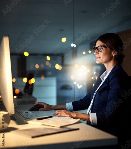 Photography Businesswoman, desktop and focus at night or employee in the office or reading emails on bokeh