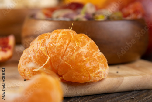 fresh sweet and sour orange on a chopping board