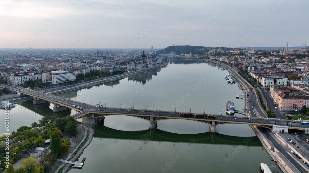 Establishing Aerial View Shot of Budapest, Hungary at sunrise. Margaret Bridge or Margit hid over River Danube, embankment