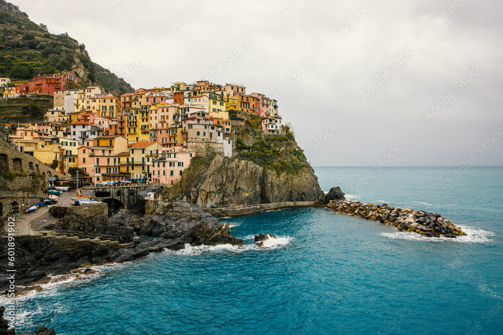 Vacation in Italy: colorful houses Manarola village on the cliff